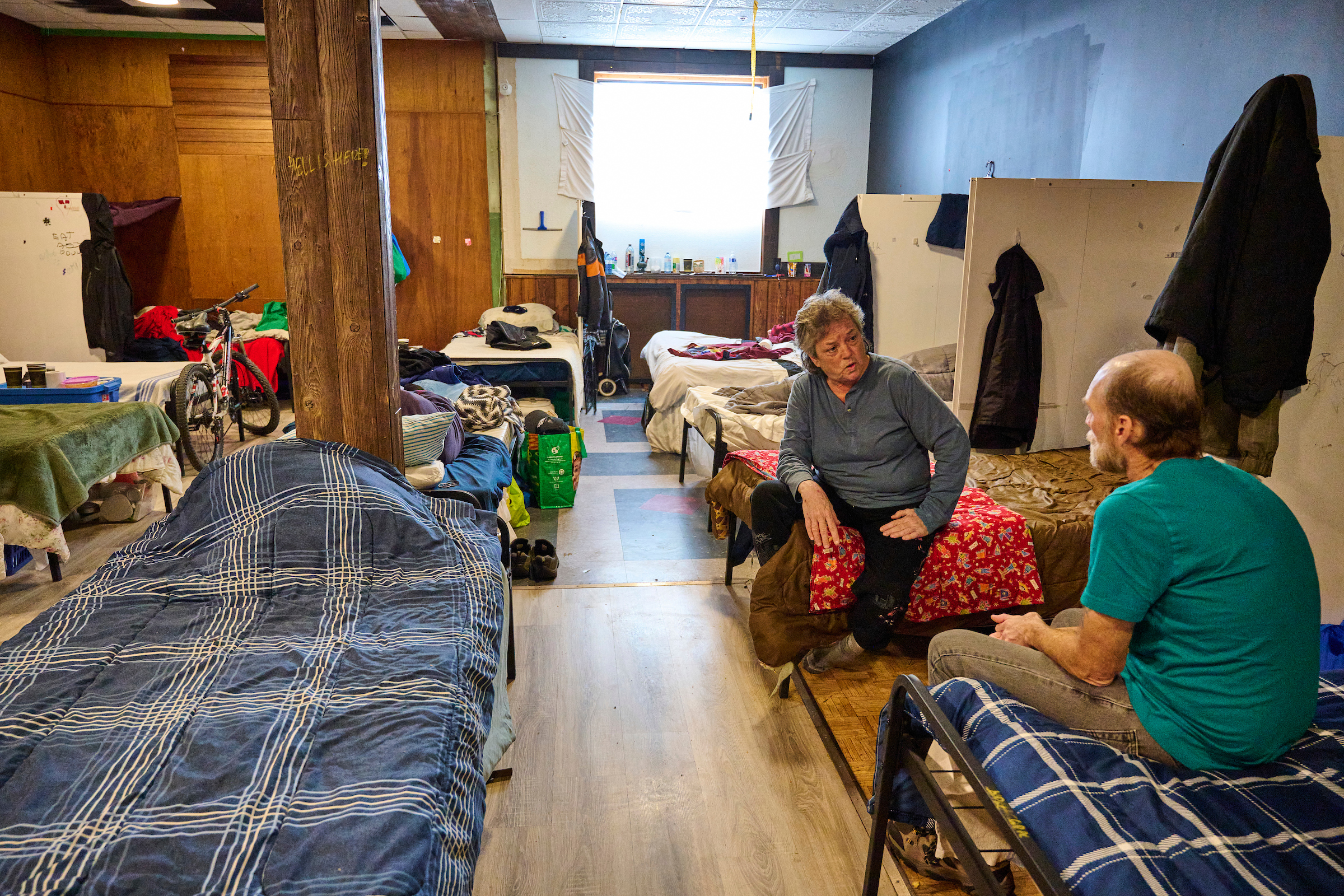 Evelyn and Richard talking in the quiet room at King Street Shelter in Kitchener, November 2023.