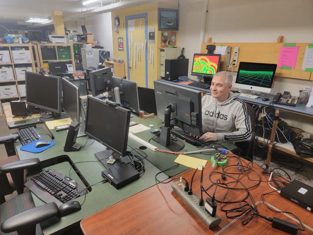 A technician works on refurbishing computers in The Working Centre's Computer Recycling Project, Kitchener, Ontario.