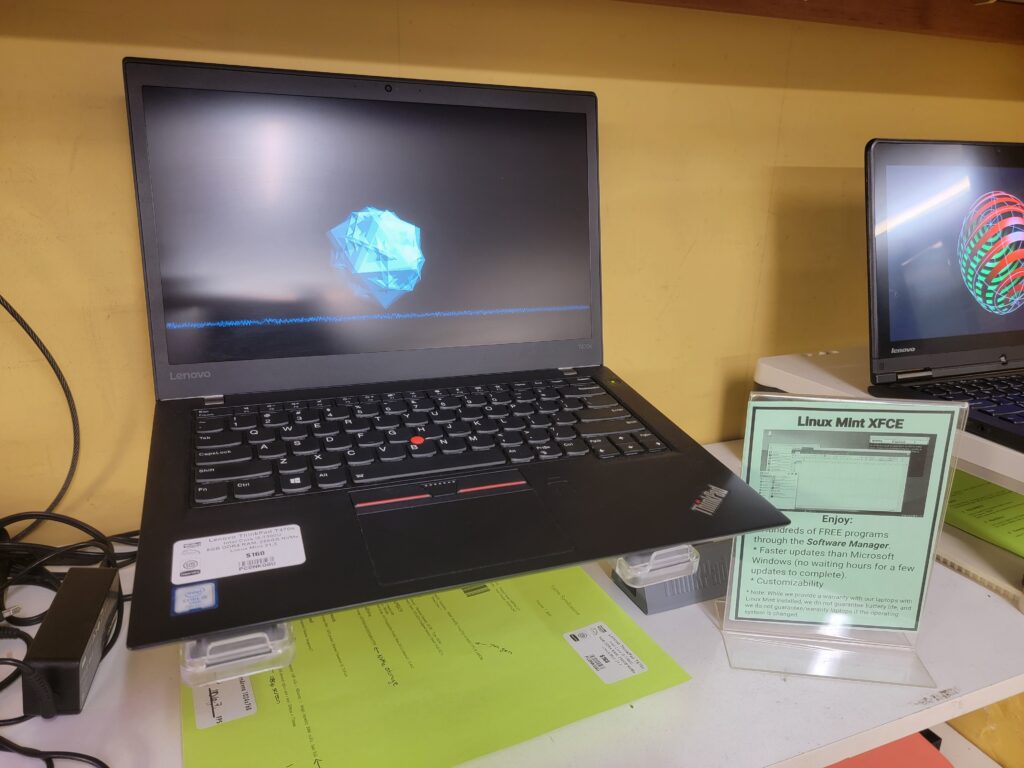 A refurbished Lenovo laptop running Linux Mint XFCE, available at The Working Centre's Computer Recycling Project in Kitchener, Ontario.