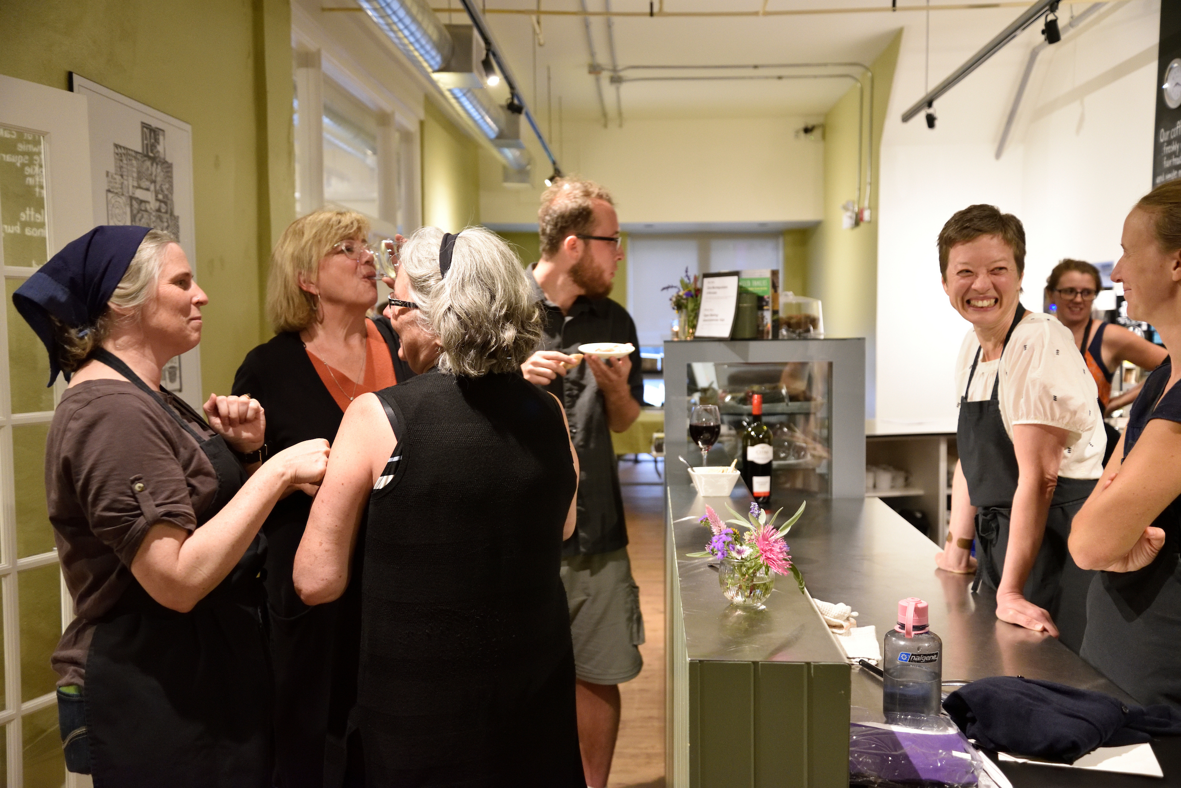 Mary Berry, daughter of Wendell Berry, speaking with attendees at a Fermented Thoughts evening at Fresh Ground in Kitchener, Ontario.