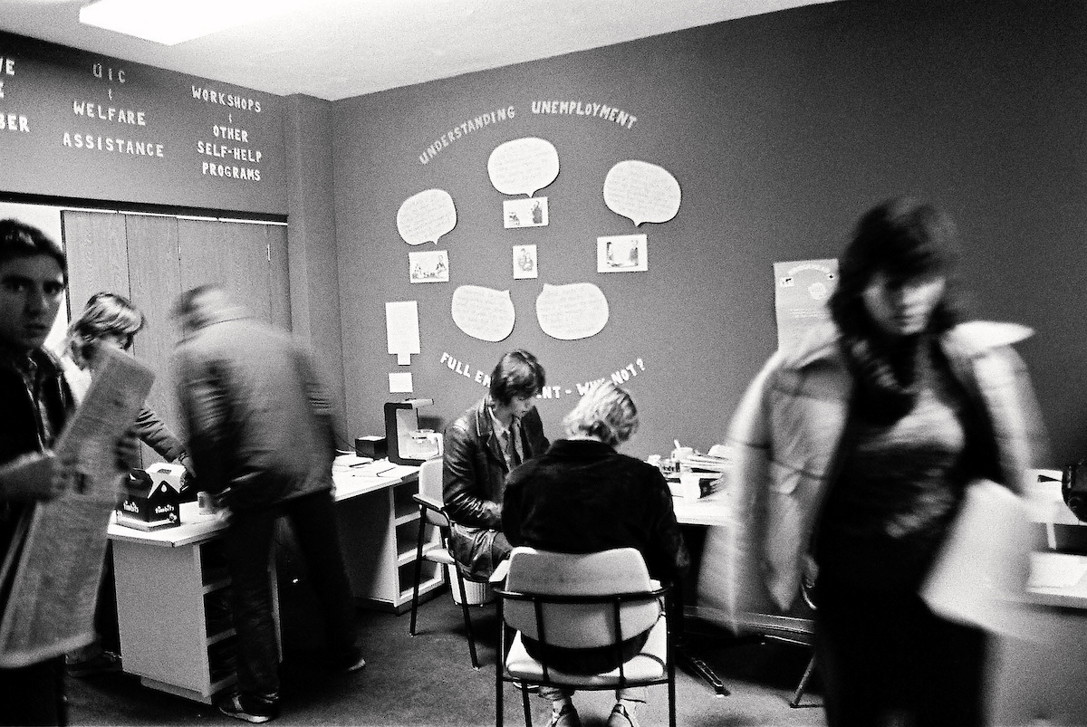 Black-and-white image of The Working Centre’s original office at 94 Queen Street South, Kitchener, Ontario, around Christmas 1983.