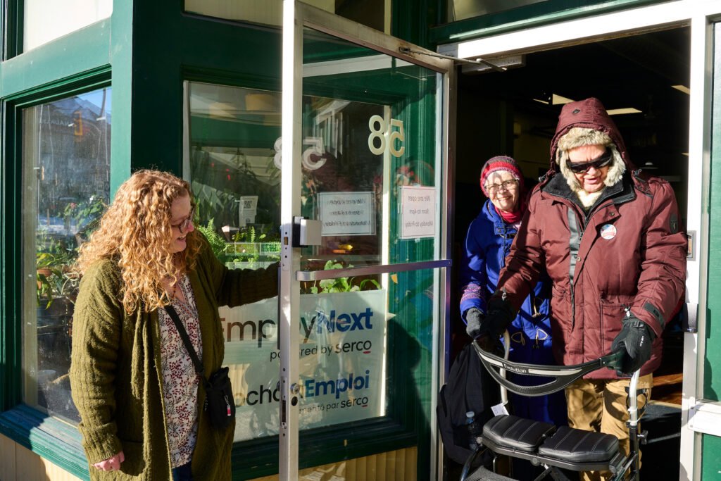 A couple leaving the Job Search Resource Centre